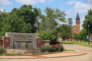 Image of the NSU Tahlequah Fountain with Seminary Hall in the background