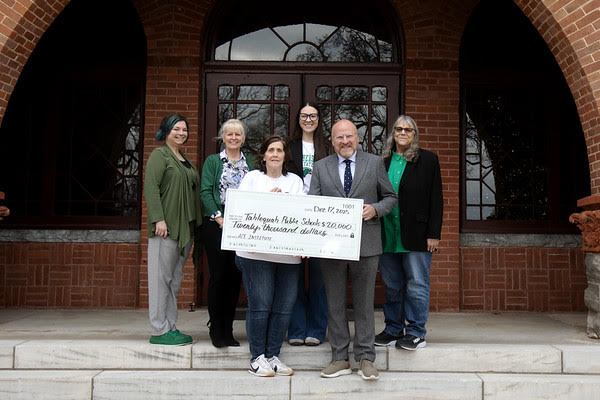 Tahlequah Public Schools and Northeastern State University leaders pose for a group photo, from left to right: Amy Johnson, Dr. Vanessa Anton, DeeAnn Mashburn, Ana Landsaw, President Rodney Hanley, and Dr. Renee Cambiano.