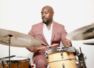 Uylsses Owens Jr. playing the drums